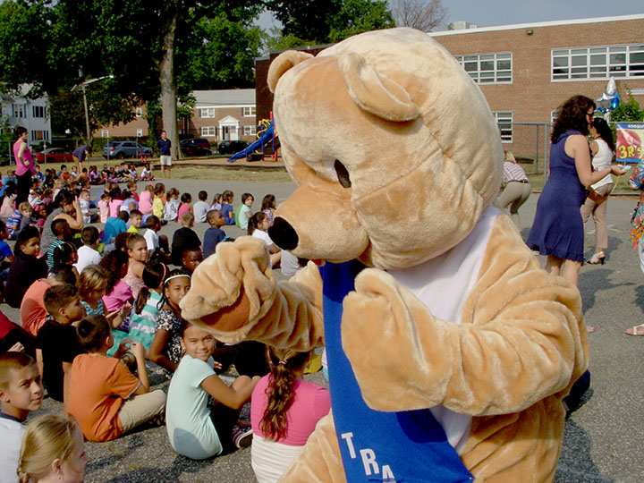 (above) Tracker the Bear Welcoming everyone Back to School.
