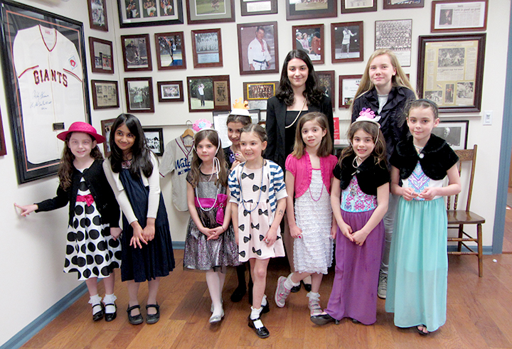 (above Front Row, l-r)Troop 65004 Reese Fishelman, Giya Parikh, Nicole Dahl, Isabella Posado, Garance Lesegretain, Hannah Stefanovic, Julia Biviano, Bridge Biviano. (Back Row, l-r): Gianna Tautonico and Annika Schmidt.