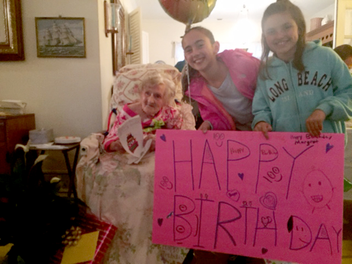 (above) Margaret Beauman of Mountainside who turned 100 years old on Oct. 28th. The local community came out to celebrate including Police Officers, Girlscouts, Boyscouts, and many other friends and family.Thetwo girls to Margaret's rightare Lilah DiNorscio and Gianna Basile. Margaret is a big fan of the Yankees and Derek Jeeter.
