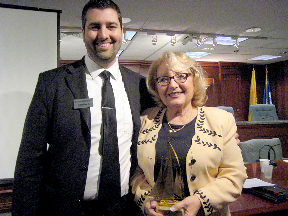 (above) November Warren Township Chamber of Commerce meeting. Evan Tornquist from Fulton Bank, head of Warren Chamber with 30 second commercial winner Carolann Garafola from Mt. Bethel Village.