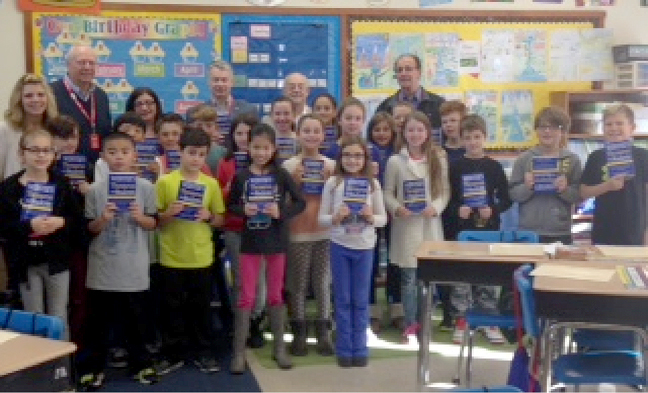 (above l-r), 4th grade Deerfield Elementary Teacher, Mrs. Shannon Keegan, and Rotary Officials John Schnakenberg, Rose Marie Sinisi, Glenn Mortimer, Bart Barre, and Dan Falcone.