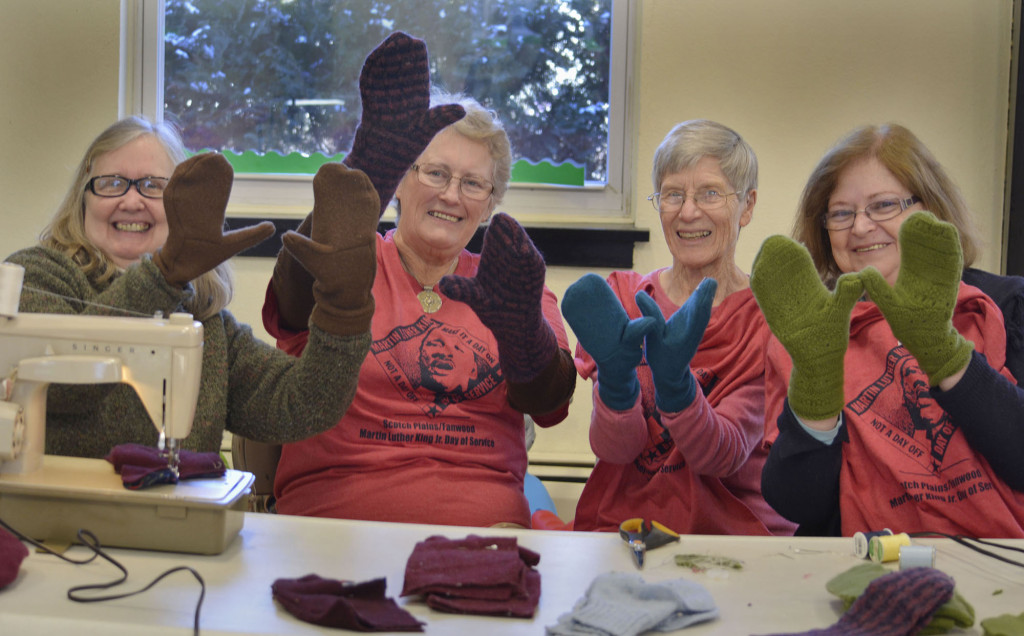 (above, l-r) Volunteers at the Fanwood Presbyterian Church show off the mittens they made from old sweaters, Kris Adams of Fanwood, Meril Davies of Scotch Plains, Cena Pollitt of Fanwood, and Eileen Morris of Fanwood.