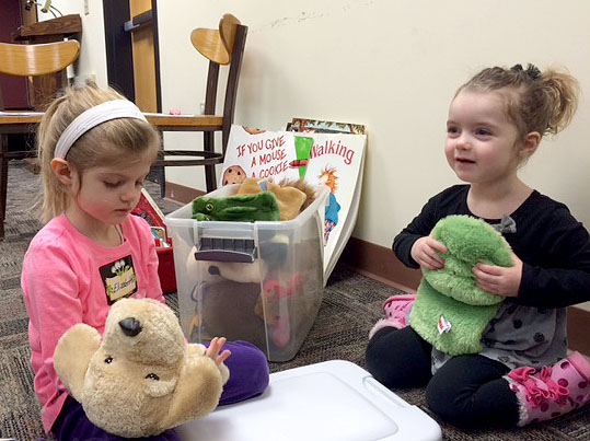 (above l-r) Elizabeth and Shannon Clancy enjoy a morning of fun, literacy activities.