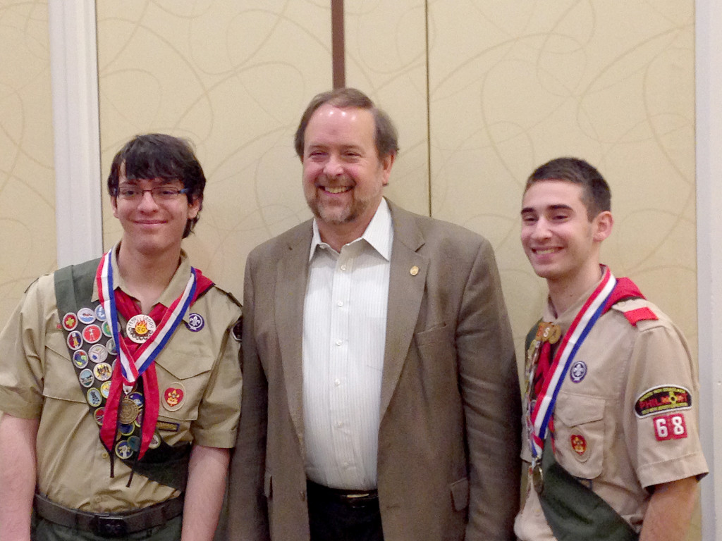 (above l-r) flanking Troop 68 Scoutmaster Cliff Boldt) Colin Hegarty and Nick Young received BSA Scholar Athlete Awards at a recognition breakfast on December 20. The award is given by Patriots Path Council of BSA to over 50 Scouts from central New Jersey troops who have excelled in the classroom and on the athletic field while also being successful Boy Scouts.
