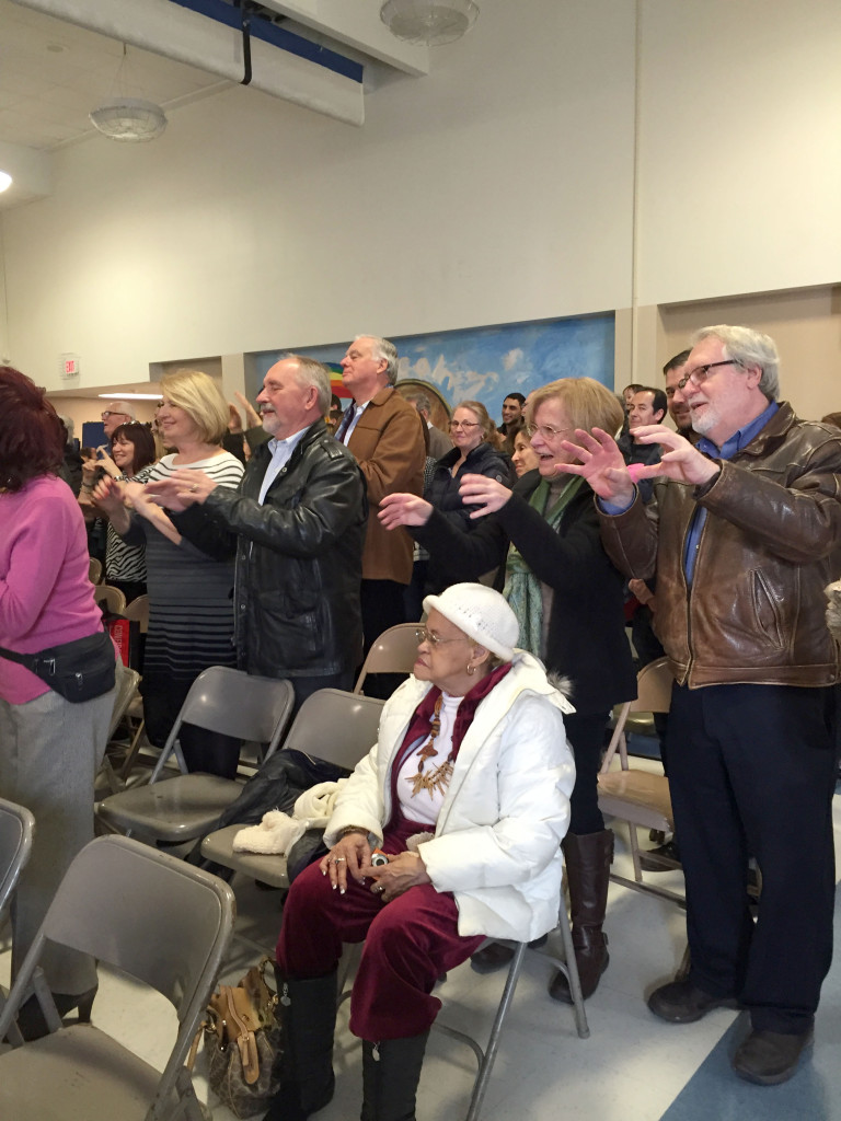 Grandparents in audience join in dancing