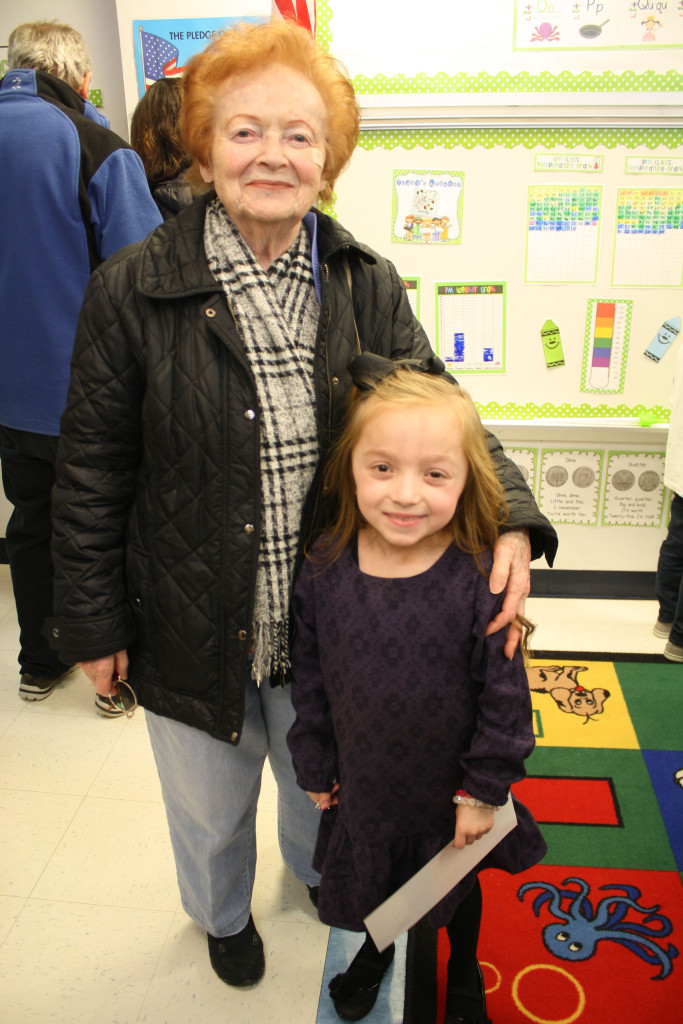 Happy kindergartner with grandparent