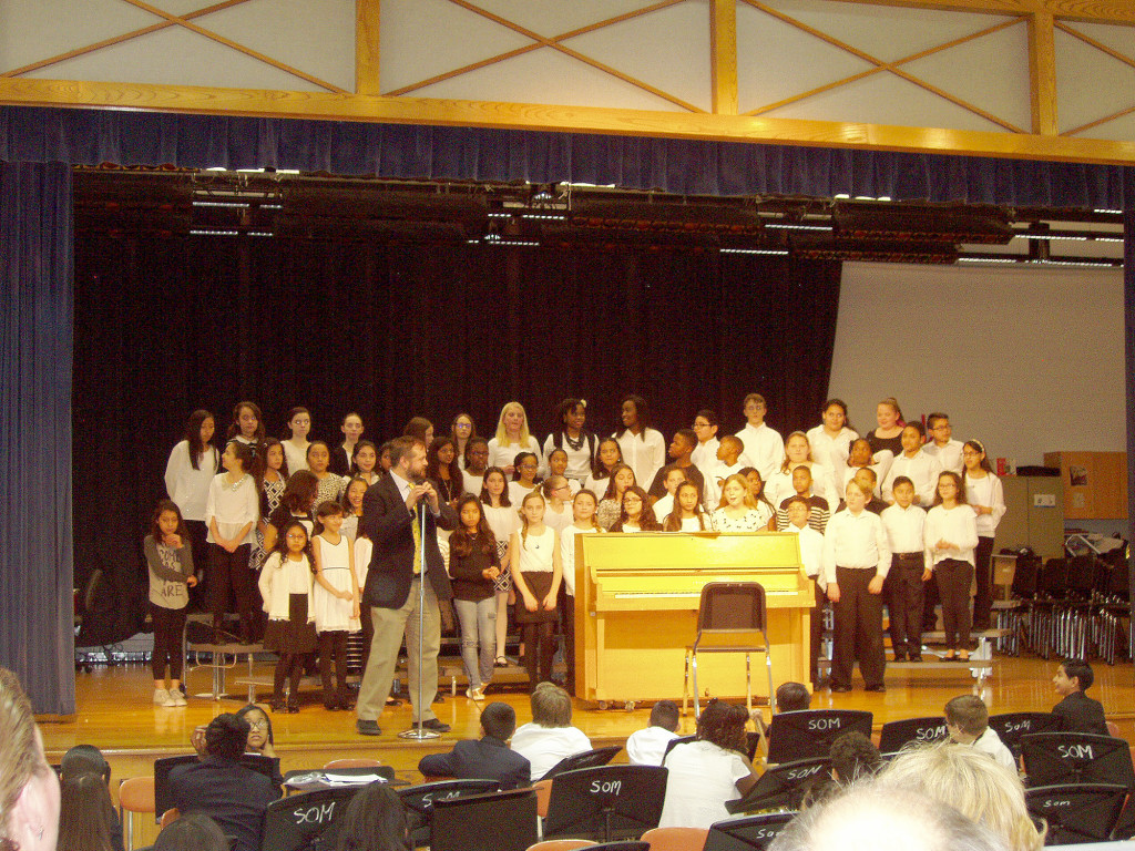 (above) The Somerset School Dragon Band warms up under the direction of Dorian Parreott II the night of the Somerset School Band, Singers, Chorus Concert.