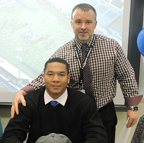 (above) Arthur and Coach Robert Lake - the former head football coach.