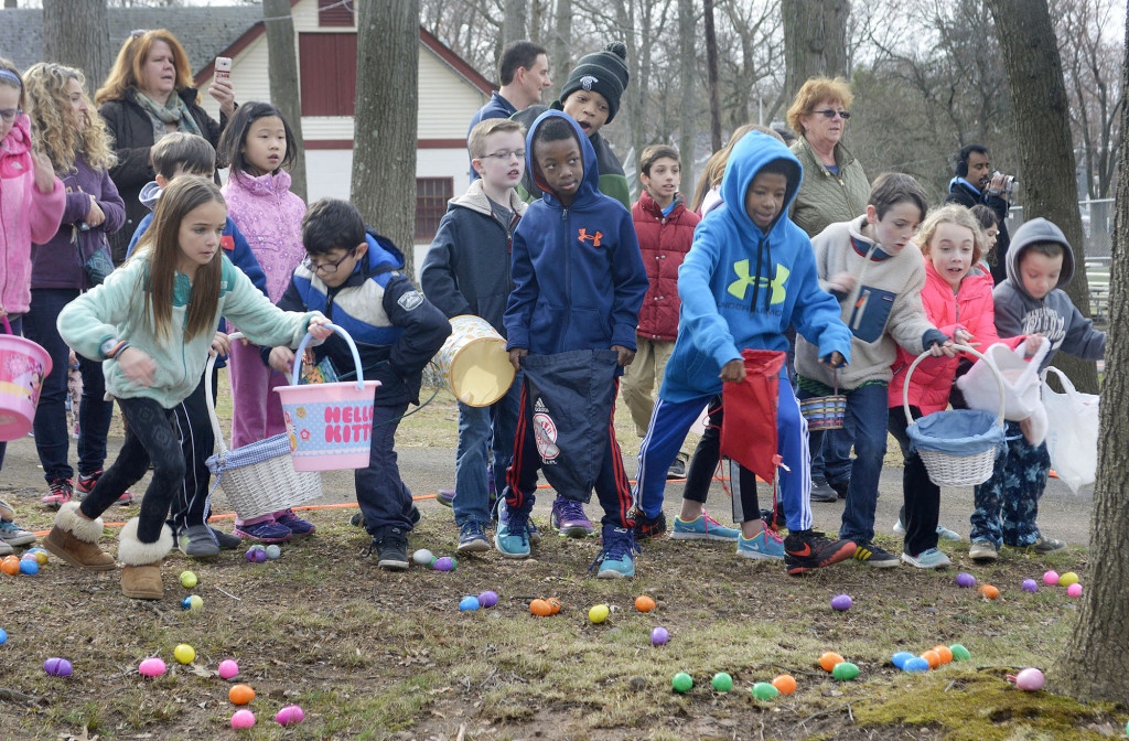 The race is on the prize eggs at the annual Easter Egg Hunt in Forest Road Park in Fanwood, NJ, Saturday, March 19, 2016. (Photo by Brian Horton)