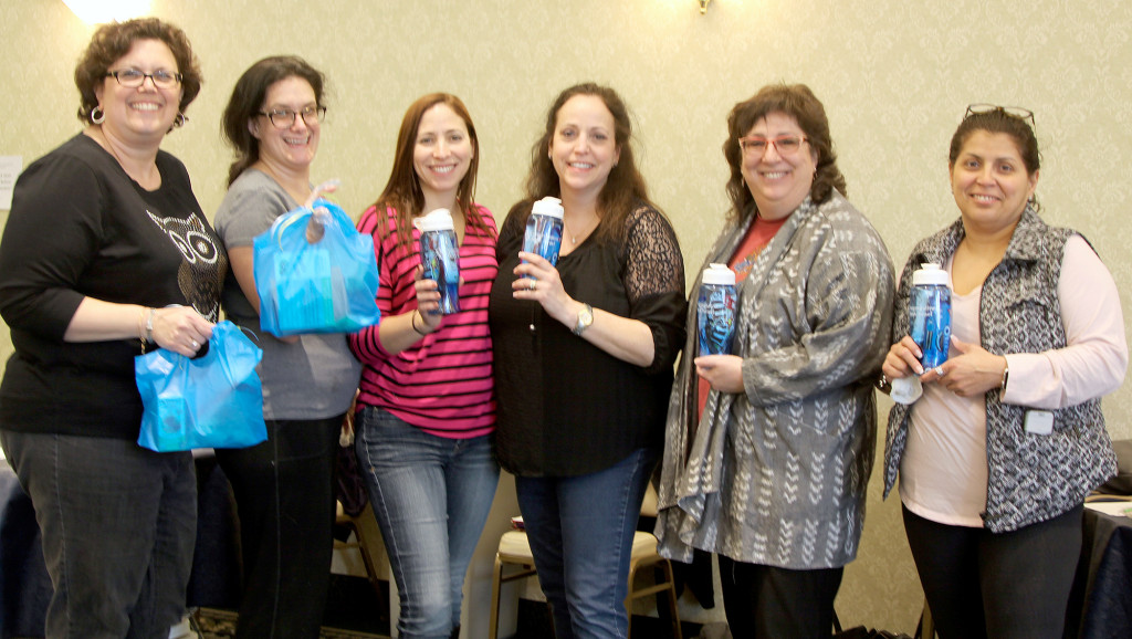 (above, l-r) Chairs of Congregation Beth Israel’s Purim outreach project - Robin Sabony; Debbie Abrams; Carrie Jaffe; Marcia Wiener, Sisterhood co-president; Ilyse O'Desky; and Diana Cooper, Sisterhood co-president.