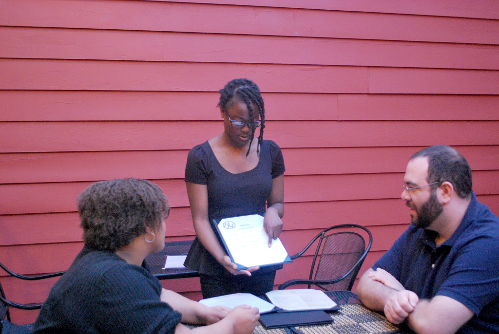 (above) Gelsey Pierre suggests one of the restaurant's specialties.