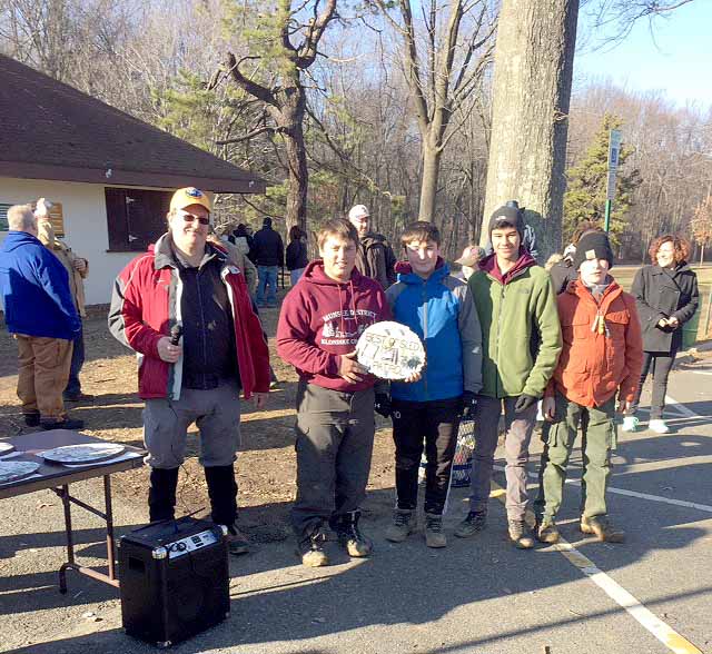 (above, l-r) Representing Troop 75- Patrol leader Peter DePonte, Luke O'Brien, Lucian Mahadeo and Peter Hrycak accept the award
