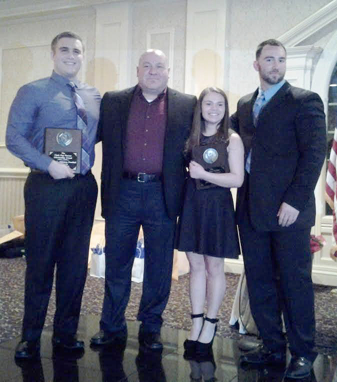 (above) Justin Falke and Brianna Torres receive the Clark Pop-Warner Scholarships.