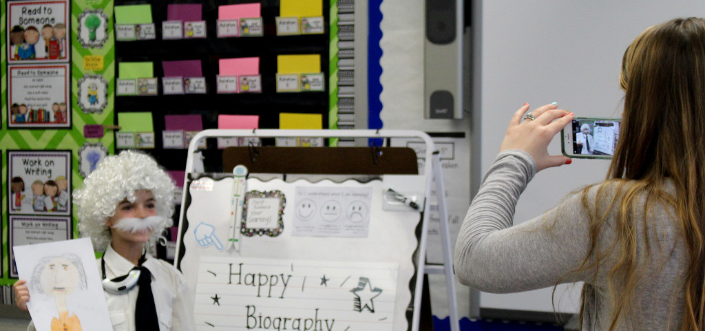 (above) Second grade teacher Rebecca Sutherland snaps a photo of Albert Einstein (a.k.a. Ekaterini Papsouliotis).
