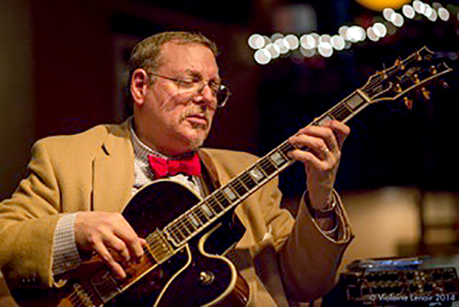 (above) Guitarist Joel Perry performs Rodrigo’s Concierto de Aranjuez.