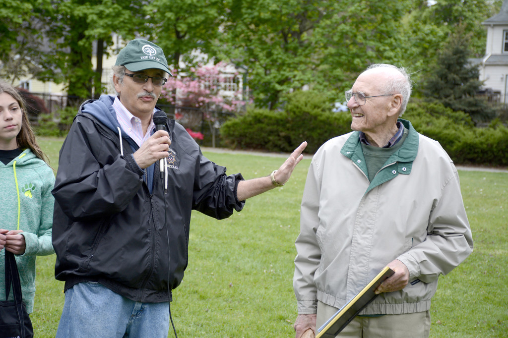 (above, l-r) Shade Tree Commission Chairman Steve Falco presents gifts to Earl Phillips, 94, who retired from the commission after 30 years of volunteer service.