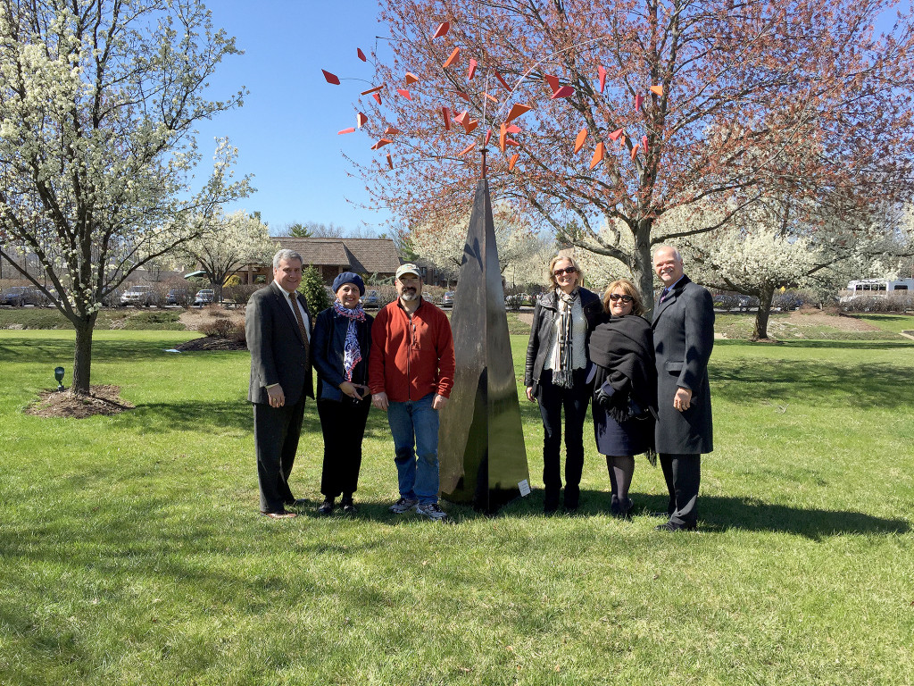 (above, l-r) Kerry Lee, manager of Best Western Hotel, Marjan Nirou Saniee, chair NP Public Art, Tom Holmes, creator of "Spinning Falls", Theresa Turner, NPPA member and sponsor of the sculpture, Christine Morgan representing Mayor Al Morgan, Doug Marvin, New Providence Borough Administrator.