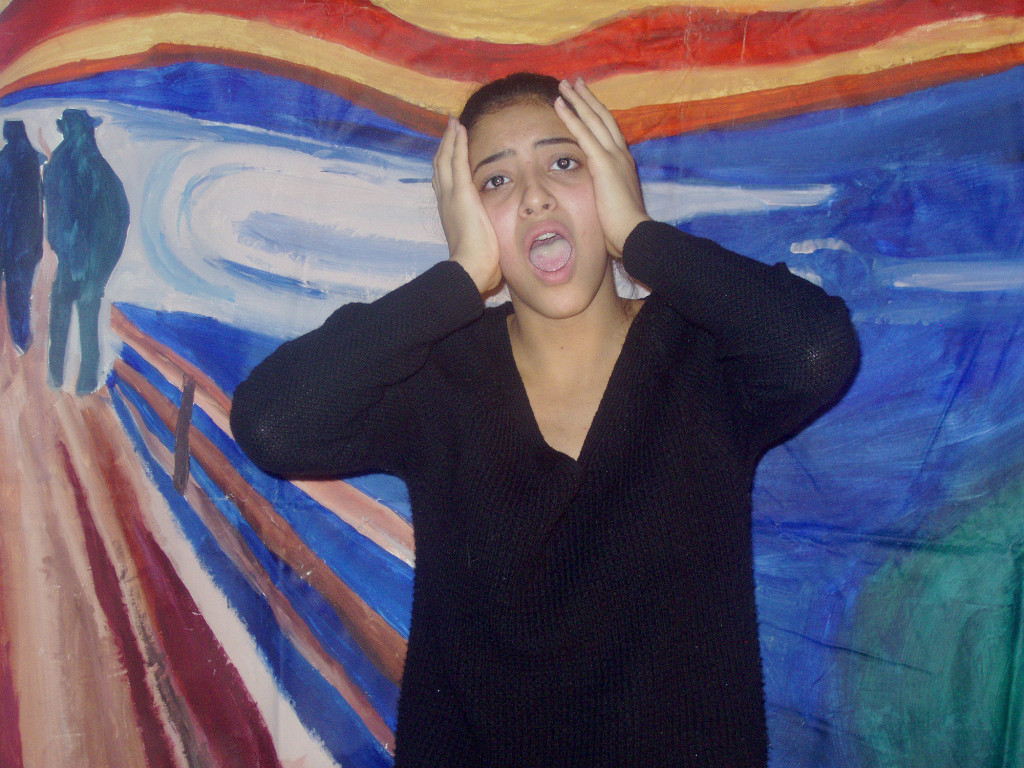 (above) North Plainfield High School Sophomore Noran Zaher, Living Theatre actor, wrote her own lines, performed them live to illustrate this well-known piece of art, “Scream.” Two in the scene liked the view of the bridge, lake and mountains. The main character called the view, “The infinite scream of nature.”