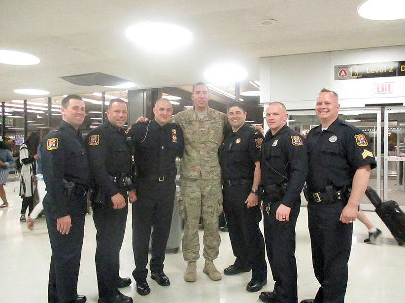 (above) Members of the Linden Police Department recently travelled to Newark Liberty Airport to welcome home one of their own. Officer Daniel Araque recently returned from a tour of duty with the U.S. Army in Iraq. Welcome home, Dan, and thank you for your service, both home and abroad.