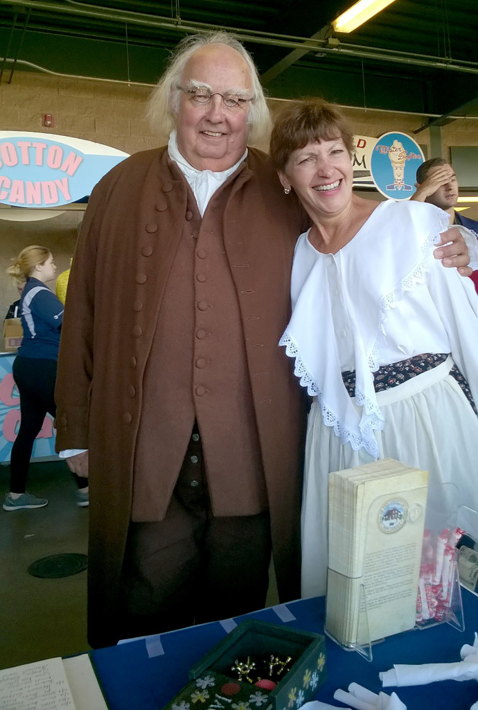 (above) "Benjamin Franklin" greets Kathy Arminio, trustee of the Union Township Historical Society, at the Somerset Patriots' Revolutionary Spirit Night.