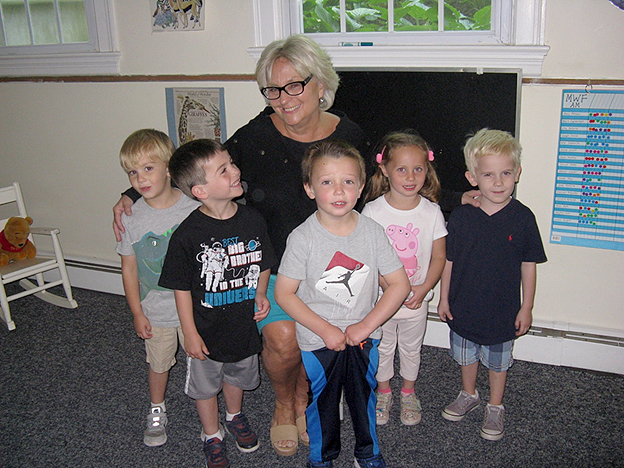 (above) Nursery School Director, Jeanne Ross with children from New Providence Preschool.