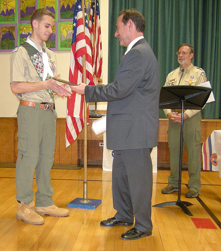 (above) Mr. Neal Drasin from Warren/Watchung Rotary Club presenting Rob with a Certificate of Achievement during his Eagle Court of Honor Ceremony, while Scout Master Mike Fogarty looks on.