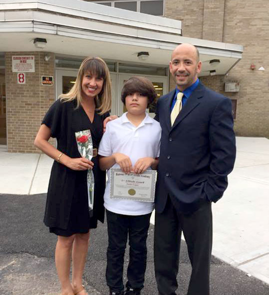 (above) Justice Lopez with his parents Laura and Ray.