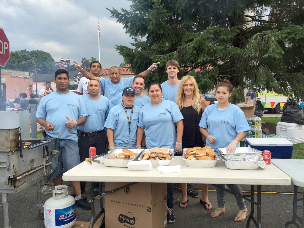 (above) Members of the community working as a team to make and serve food for the visitors of the event.