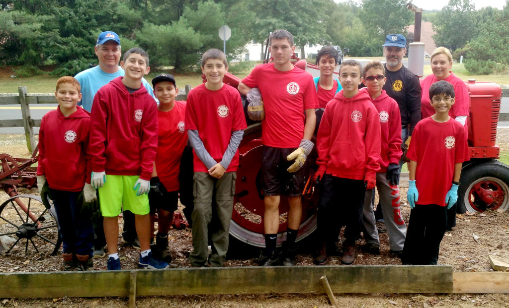 (above l-r) Chris Doss, Gary Guth, Nicholas Guth, Anthony Azevedo, Graham Schmidt, David Cantone, Jaison Desai, Matthew Nunes, Sean Gubitosi, Paul Monti, Kanav Desai and Paula Schmidt.